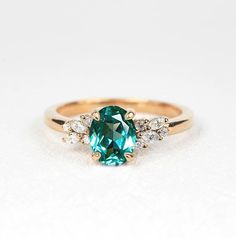 This beautiful ring comes with a center oval shape 1.5ct lab-grown Mint Green Sapphire and 6 round-shape diamonds and 4 marquise shape Diamonds. Available in yellow gold, rose gold, white gold or platinum.It is a perfect choice for those who are looking for a dainty engagement ring in 9k/14k/18k Yellow, Rose or White Gold.It is also a great gift for Christmas, Valentine's day, birthday, anniversary or for celebration for any special occasion.✯✯ Free UK and USA shipping ✯✯✯ ✯ No Custom Charges fo Diamond Ring Oval, White Gold Sapphire Ring, Dainty Engagement, Green Sapphire Engagement, Green Sapphire Engagement Ring, Green Sapphire Ring, Dainty Engagement Rings, Marquise Shape Diamond, Sapphire And Diamond Ring