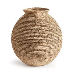 a large woven vase on a white background