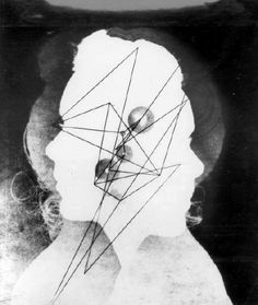 a black and white photo of a woman's face with lines on her head