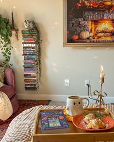 a tray with food on top of it next to a chair and fireplace in the background