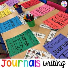 a table topped with lots of colorful bulletin boards