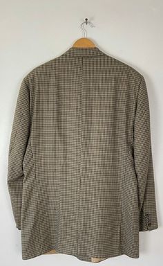 "-Description- >men's brown & blue plaid sport coat >three button front >four buttons on the cuffs >three open pockets on the front >lined >size 46L >classy plaid! >condition: great >color(s): brown, blue, black >fabric(s): 100 wool >brand: nathan david >care: dry clean -Measurements- >size: 46L ✩ all measurements are taken with the item laying flat & some sizes are estimates so please check measurements ✩ chest: 47\" / 119cm length: 34.5\" / 87cm s Fitted Plaid Sport Coat With Long Sleeves, Tailored Plaid Sport Coat With Long Sleeves, Plaid Sport Coat For Business, Plaid Long Sleeve Sport Coat For Business, Plaid Long Sleeve Sport Coat For Business Casual, Long Sleeve Plaid Sport Coat For Business, Plaid Long Sleeve Sport Coat With Hidden Buttons, Brown Button-up Sport Coat For Business Casual, Casual Plaid Single-breasted Sport Coat