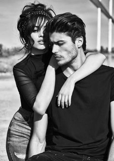 a man and woman are posing together in black and white, with the caption caciliolan