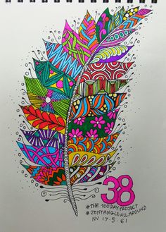 a drawing of a colorful feather with the number thirty nine on it's side