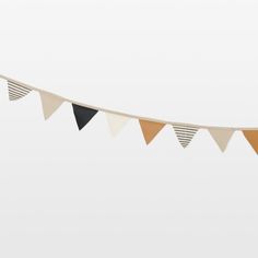 a white and black bunting is hanging in the air