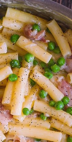 pasta with peas and ham in a pan