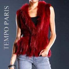 Rare Find! An Absolutely Stunning Statement Vest From Tempo Paris With A 1920s Flappers Jazz Age Vibe! One Of Those Hot Trendy Timeless Fashion Pieces That Are Easy To Throw Over Anything, And Look Super Stylish! It Comes In Gorgeous Red Wine/Burgundy That Adds A Perfect Splash Of Color To Any Outfit. Incredibly Soft And Fluffy, Crafted By Hand From High-Quality Rex Rabbit Fur With Fox Trim. Desinged With A Straight-Cut Silhouette, Shawl Collar, Hook And Eye Closure, And Beautiful Tassels At The Hem. It Can Be Left Undone For A Perfect Casual Look. Super Chic, Luxurious, And Surprisingly Versatile, It Will Look Equally Fabulous With Leather Pants/ Distressed Denim Skinnies, As It Is Over A F Timeless Fashion Pieces, Fox Fur Vest, Rex Rabbit, 1920s Flapper, Jazz Age, Throw Over, Fashion Pieces, Wine Colored, Fur Vest