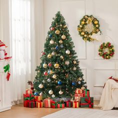 a decorated christmas tree with presents under it