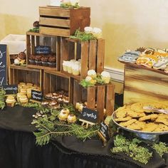 a table topped with lots of food and desserts