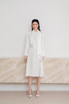 Aboli A-line Long Sleeved Silk Satin Midi Dress | MEAN BLVD Modern A-line Midi Dress For Formal Occasions, Sleek White Midi Dress For Spring, Elegant Tailored A-line Midi Dress, Sleek Semi-formal Spring Dresses, Chic White Semi-formal Midi Dress, Tailored Elegant White Dress, Tailored Midi Dress For Spring Evening, Tailored Spring Evening Midi Dress, Chic Tailored Midi Dress For Spring