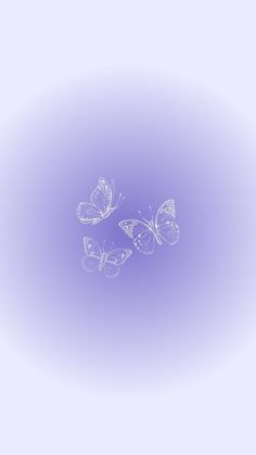 three butterflies flying in the air on a purple background