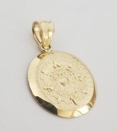 NEW-14k Real Solid Yellow Gold Aztec sun calendar Pendant For Chain. Material Type 14k Gold Avg. Weight 2.1 grams Height 21 MM Width 21 MM 14k Yellow Gold Sun Design Jewelry, 14k Yellow Gold Jewelry With Sun Design, Gold Jewelry With Sun Design In 14k Gold, Gold Jewelry With Sun Design, Gold Hamsa, Pretty Pendant, Huggies Earrings, Black Velvet, Charm Pendant