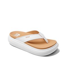 Reef-Cushion Bondi Platform Sandal Fashionable and comfy, the Reef Cushion Bondi platform sandal will be the perfect choice for summer adventures. Water-friendly and flexible, this thong sandal is crafted with lightweight EVA upper, footbed and sole to provide excellent cushioning and rebounding support. White Summer Wedge Sandals, White Platform Sport Sandals For Beach, White Platform Slides With Round Toe, White Platform Sandals For Vacation, White Eva Sandals For Vacation, White Sandals With Arch Support For Spring, Comfortable White Eva Slides, White Eva Slides, White Synthetic Sandals For Beach Season