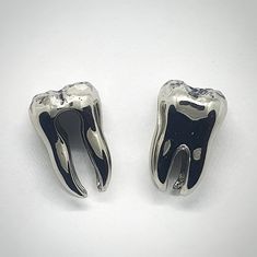 Bringing a bold statement to your day-to-day life, our Goliath Tooth earweights fit every style with there timeless yet simple design. Hand-crafted in the shape of a chunky back molar, their highly polished surface is always an eye-catcher. Their light weight makes for a comfortable fit while their gentle opening is small enough to avoid them falling out on a more active day. Available in Copper, White Brass and Yellow Brass. Wearable: 13mm Height: 28 mm Width: 17mm Weight: 25.3 grams per piece Ashes Jewelry, Ear Weights, Handmade Brass, Piercing Jewelry, Simple Design, Simple Designs, Etsy Accessories, Accessory Gift, Gemstone Rings