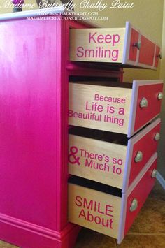 a pink dresser with three drawers that say smile about and keep smiling because life is a beautiful thing