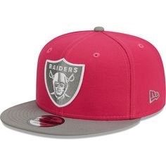 the new era oakland football team snapback hat is available in pink and grey, with an embroidered logo on the front