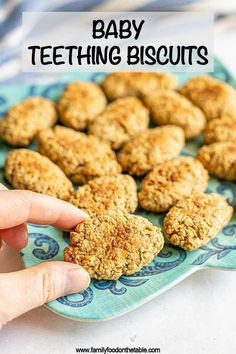 homemade teething biscuits on a blue plate