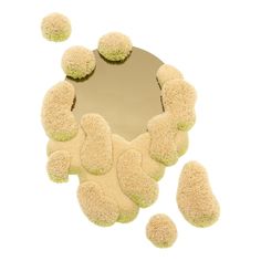 a mirror that has some balls on it in the shape of a circle with four smaller ones