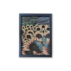 a painting with sunflowers and butterflies in the middle is hanging on a wall