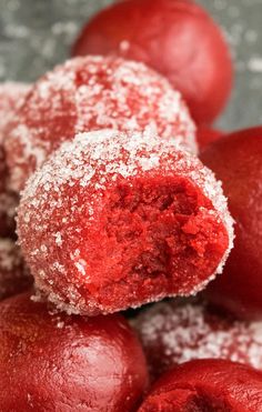 powdered sugar coated doughnuts on top of each other