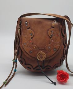 Antique Leather Bag, Vintage Satchel Shoulder Bag For Festival, Handmade Vintage Satchel For Festival, Antique Leather Bags For Everyday Use, Vintage Crossbody Shoulder Bag For Festival, Retro Hand-tooled Bag For Everyday Use, Handmade Vintage Brown Bag, Antique Handmade Bag For Everyday Use, Retro Hand Tooled Bag For Everyday Use