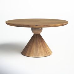 a round wooden table on a white background