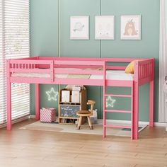 a pink bunk bed in a child's bedroom