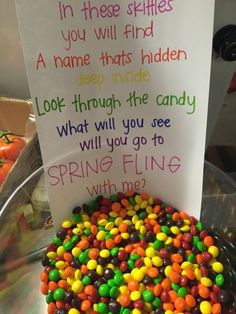 there is a sign on the table that says, in these skies you will find a name that hidden look through the candy what will you see