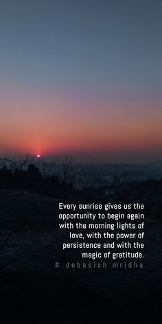 the sun is setting in the distance with a quote on it that says, every sunrise gives us the opportunity to begin again