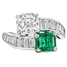 Specification:- Stone Details :-  *Diamond Material: Cubic Zirconia (CZ) *Diamond Shape : Emerald & Asscher  *Total Diamond Weight : 7.70TCW (Approx.) *Center Diamond Dimension : (9x7 MM Emerald ) ( 8.50 MM Asscher ) *Center Diamond Weight : ( 2.62CT Emerald ) ( 3.67CT Asscher ) *Side Diamond Dimension : 3x1.50, 3.50x1.80, 4x2 MM *Side Diamond Weight : 1.41CT *Diamond Color: Green / White *Clarity: VVS *Making Process: Handmade by our Experienced Staff. *Stamp: Our All Rings Stamped According to Asscher Cut Diamond Ring, Asscher Engagement Ring, Channel Set Rings, Emerald Cut Diamond Ring, Faceted Ring, Asscher Cut Diamond, Diamond Engagement Wedding Ring, Asscher Cut, Set Ring