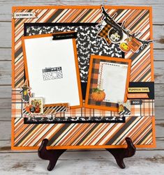 an orange and black scrapbook layout with pumpkins, stripes, and bats on it