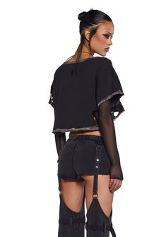 in a mesh and washed cotton construction. Long sheer mesh sleeves with a short sleeved cotton top layer, a distressed cutout design, a cropped fit, and an embroidered “D” logo on the back. Cutout Shorts, D Logo, Mesh Long Sleeve Top, Cutout Design, Mesh Sleeves, Mesh Long Sleeve, Cotton Top, Goth Fashion, Exclusive Collection