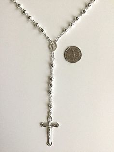 "925 sterling silver italian rosary 30\" long . for protection and good luck made in italy 6 mm beads gr:36 rosario de 925 plata esterlina 30\" largo .para proteccion y buena suerte . hecho en italia 6 mm beads gr: 36" Silver Rosary Bracelet With 8mm Beads As Gift, Sterling Silver Jewelry With 8mm Silver Beads, Spiritual Silver Jewelry With 8mm Beads, Sterling Silver Rosary With Silver Beads As Gift, Silver Necklace With 8mm Beads For Gifts, Silver Spiritual Jewelry With 8mm Beads, White Gold Sterling Silver Rosary As Gift, Spiritual Silver Rosary As Gift, Silver Spiritual Rosary Bracelet