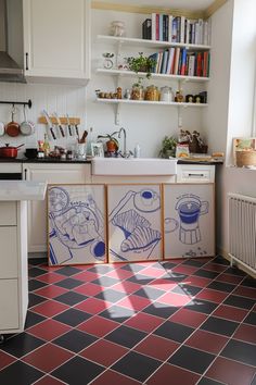 the kitchen is clean and ready for us to use it's tile flooring