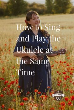 a woman standing in a field with an acoustic guitar and the words how to sing and play the ukulele at the same time