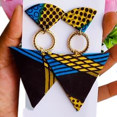 These outstanding  unique handmade earrings are made with vibrant African print also known as Ankara fabric. The beauty of these earrings is that they have multiple colors which means they will go with different outfits. They are also super light weight. You could wear these statement african earrings to different occassion. They are must have earrings.   You could follow me on my Instagram account @lidizafrifabs Diy African Earrings, African Earrings Handmade, Afro Accessories, African Earrings Ethnic Jewelry, Ankara Earrings Handmade, African Earrings Handmade Fabrics, African Inspired Earrings, Ankara Earrings, African Wooden Earrings