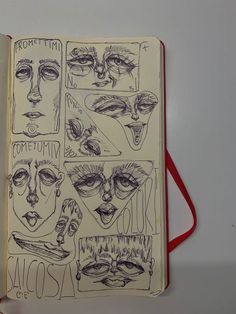 an open notebook with some drawings on it