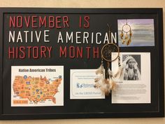 a sign with native american history on it and pictures attached to the wall behind it