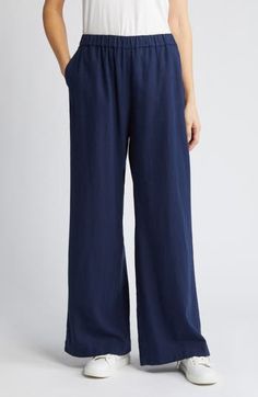 Cut from a breezy linen blend with a high waist and wide legs, these pull-on pants are a cool remake of a closet classic. 30" regular inseam; 25" leg opening; 11 12" front rise; 16" back rise (size Medium) 28" petite inseam; 24" leg opening; 11" front rise; 15" back rise (size Medium P) Elastic waist Front slant pockets; faux back welt pocket 55% linen, 45% rayon Machine wash, tumble dry Imported Women's Clothing