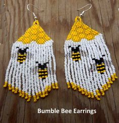 two pairs of beaded earrings with yellow and white beads