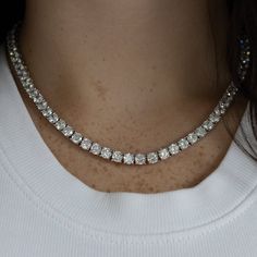 Beautiful, High Quality Tennis Chain Necklace Featuring Round Cubic Zirconia Stones. A Sophisticated Necklace To Add Glam To Your Look! Available In Silver Or Gold 18k White Gold Or Gold Plating Over Metal Alloy Highest Quality Cubic Zirconia Stones Available Lengths: 16", 18" Available Thicknesses/Widths: 3mm, 4mm, Or 5mm This Item Is Plated To Resist Against Tarnishing. Over Time, Plated Jewelry May Tarnish And To Prevent This, We Recommend Avoiding Exposure To Water, Sweat, Etc To Ensure The Tennis Necklace Diamond Gown, Silver Tennis Chain Necklace, Elegant Luxury Tennis Necklace With Brilliant Cut, Tennis Silver Necklace, Cubic Diamond Necklace, Luxury Lab-grown Diamond Tennis Necklace With Brilliant Cut, Kate Moss Diamond Necklace, Diamond Necklace Sparkle, White Topaz Tennis Necklace