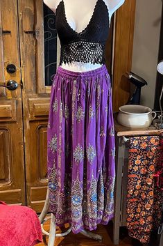 Sequined Embroidery Purple Gold Painted Long Maxi Skirt, Bohemian Boho Chic Festival Ethnic Hippie Summer Sparkle One Size Feminine Long Skirt. Crochet or tie dye top is not included. You will feel so good in this gorgeous skirt. Beautiful Long Maxi skirt hand embroidery, hand sequined gold painted and it sparkles so each skirt is unique and one of a kind.  This rayon Green skirt is made using soft light and beautiful rayon fabric. Rayon was the first manufactured fiber. The term rayon was offic Traditional Beach Skirt, Bohemian Boho Print Skirt For Festivals, Bohemian Lined Skirt For Festival, Bohemian Skirt With Boho Print For Festivals, Bohemian Maxi Skirt For Festive Occasions, Bohemian Festival Skirt With Boho Print, Bohemian Style Skirt With Boho Print For Festivals, Bohemian Harem Skirt For Festivals, Bohemian Skirt For Festivals