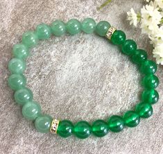 "✦Gemstone: Jade ( Color dyed), Aventurine ✦Color: Green ✦Shape: Round ✦Length: 5''-9'' ✦Bead Size: Round Bead: 6mm ✦QTY: 1 pcs / package ✦✦Please measure your wrist size, then order the bracelet. This jade bracelet is dyed color, but it is a beautiful bracelet gift for women, bridesmaid and little girls 6mm Jade Bracelet, Green Aventurine Bracelet, Crystal Bracelet, Stretchy Bracelet, Healing Jewelry, Man, Woman, Good Luck Bracelet Jade is a symbol of serenity and purity. It signifies wisdom ga Green Gemstone Stretch Bracelet Gift, Green Gemstone Crystal Bracelet For Meditation, Green Crystal Bracelet With Gemstone For Healing, Green Gemstone Crystal Bracelet Gift, Green Gemstone Beads Stretch Bracelet For Gift, Green Stretch Bracelet With Natural Stones As Gift, Green Aventurine Crystal Bracelet With Natural Stones, Green Aventurine Stretch Bracelet With Natural Stones, Green Aventurine Stretch Bracelet Gift