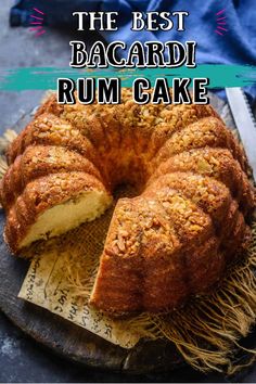 a bundt cake sitting on top of a wooden cutting board next to a knife