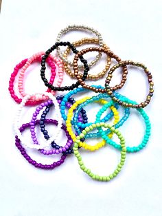 Stretch bracelets are a fun and stylish accessory for you or your little ones. Can be worn alone or stacked with other bracelets for more fun! Listing is for ONE stackable bracelet your choice of color. Message me with any custom orders if you wish to mix multiple colors in a single bracelet. Kids bracelet pairing: Pair these stacking bracelets with our adorable kids name bracelets https://www.etsy.com/listing/918899045/kids-bracelet-kids-name-bracelet Adult Bracelet pairing: Pair these stacking Trendy Adjustable Stretch Bracelet With Tiny Beads, Adjustable Playful Friendship Bracelets With Round Beads, Playful Adjustable Friendship Bracelets With Round Beads, Colorful Beaded Stretch Bracelet, Playful Stackable Adjustable Jewelry, Adjustable Stacked Beaded Bracelets With Round Beads, Adjustable Stacked Round Beaded Bracelets, Cute Everyday Beaded Bracelets, Casual Stackable Stretch Bracelet For Friendship