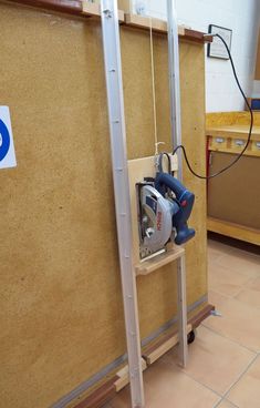 a machine that is sitting on top of a shelf in a room with tile flooring