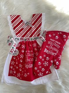 two pieces of red and white christmas clothing