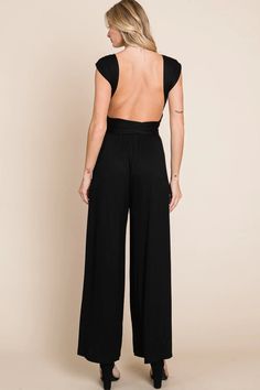 This jumpsuit is made from a soft and stretchy fabric that feels comfortable against the skin. The wide-leg silhouette offers a casual and relaxed fit, while the pockets add a practical and convenient touch. The multiway convertible design allows you to adjust the straps and neckline of the jumpsuit to suit your desired look, making it a versatile and adaptable garment. 95% Rayon, 5% Spandex Want to view this on the *Live* Sizing & Styling Guide?! Watch it in the photo section above or click her Casual Strapless Wide Leg Jumpsuit With Stretch, Casual Strapless Wide Leg Jumpsuit, Casual Strapless Wide-leg Jumpsuit With Stretch, Casual Stretch Strapless Wide Leg Jumpsuit, Solid Maxi Length Jumpsuits And Rompers For Loungewear, Solid Color Strapless Stretch Jumpsuit With Wide Leg, Maxi Length Jumpsuits And Rompers For Loungewear, Stretch Strapless Jumpsuit With Wide Legs, Black Wide Leg Jumpsuits And Rompers For Loungewear