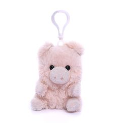 a small stuffed animal is hanging on a keychain