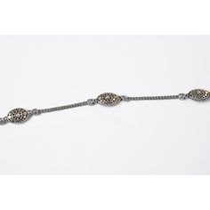 This is part of Chairish’s Fine Jewelry assortment.  This rare extra long classic John Hardy Jaisalmer Dot Sautoir necklace is sterling silver with fourteen 11.57mm wide x 15.3mm (just the oval area) oval stations embellished with 18 karat yellow gold dots.  The sections are connected to each other by abraided sterling silver chain with silver decorative arrow head shaped dot ends. The necklace is terminates with a lobster clasp.  It is marked 18k 925 JH Hallmark.  It weights 26.3 dwt or 1.90 oz Formal Jewelry With Sterling Silver Clasp And Oval Shape, Elegant Jewelry With Sterling Silver Clasp And Oval Pendant, Elegant Oval Jewelry With Oxidized Finish, Silver Oval Beads Jewelry For Formal Occasions, Formal Silver Jewelry With Oval Beads, Classic Oval Jewelry With Oxidized Finish, Oval Oxidized Metal Jewelry, Elegant Sterling Silver Jewelry With Oval Beads, Formal Oval Jewelry With Oxidized Finish